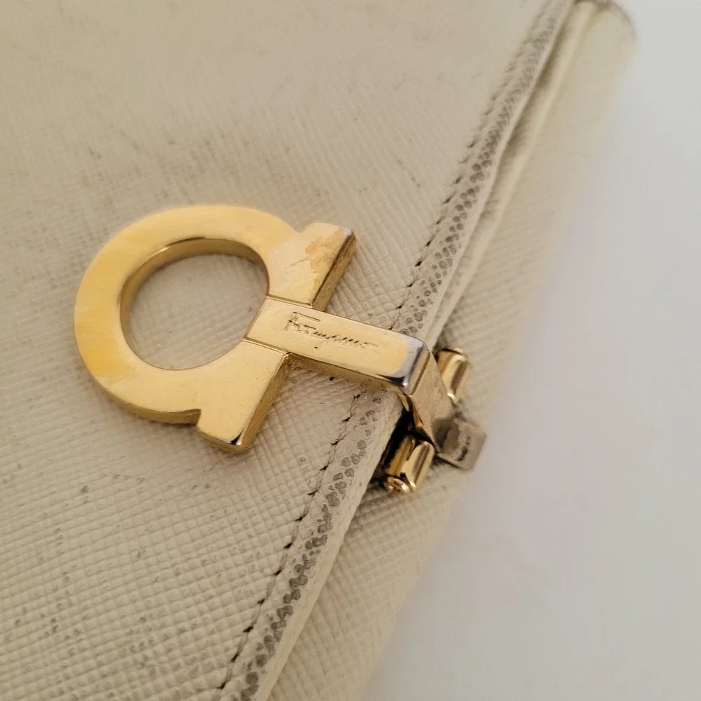 Salvatore Ferragamo Gancini Bifold Wallet Cream Saffiano Leather Gold Hardware
